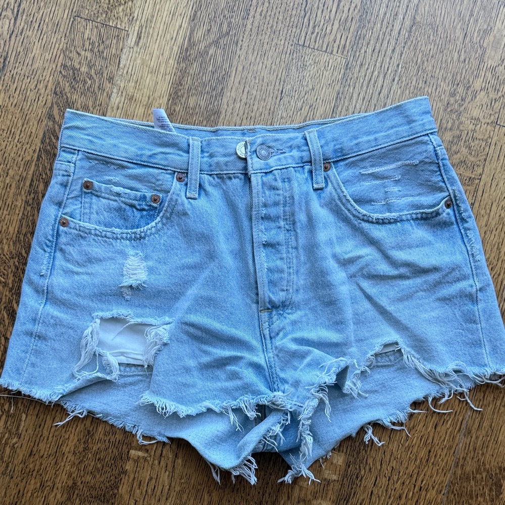 Levi’s 501 Distressed Light Blue Denim Shorts Size 28